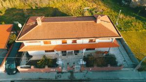an overhead view of a house with an orange roof at Anaelehouserooms LTB cod IUN P3092 - P3093 - P3094 - R6010 in Arborea