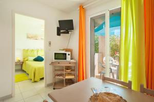 Кровать или кровати в номере Residence Motel Corsicana