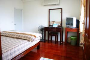 TV a/nebo společenská místnost v ubytování TopHome 9