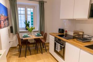 Kuchyňa alebo kuchynka v ubytovaní Charming 45m2 Apartment in Heart of Graz