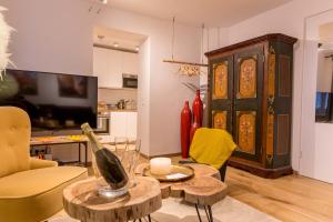 Televízia a/alebo spoločenská miestnosť v ubytovaní Charming 45m2 Apartment in Heart of Graz