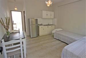 A kitchen or kitchenette at Panorama Apartments