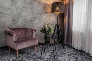 Posezení v ubytování Hotel Schwarzer Adler Stendal