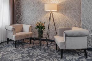 Posezení v ubytování Hotel Schwarzer Adler Stendal