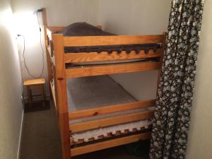Poschodová posteľ alebo postele v izbe v ubytovaní Duplex T2 Cabine aux pieds du télécabine avec parking