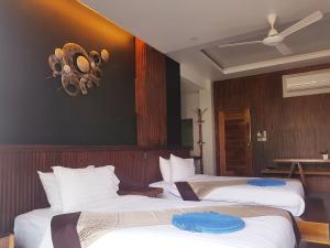Voodi või voodid majutusasutuse In Touch Resort toas