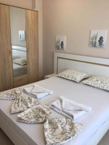 Postel nebo postele na pokoji v ubytování Guest rooms Luxor