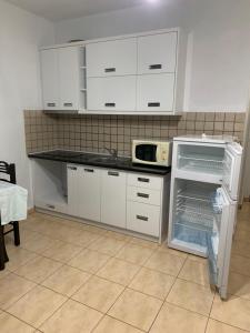 Kuchyň nebo kuchyňský kout v ubytování Espana aparthotel