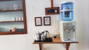 Kuchyň nebo kuchyňský kout v ubytování CHARAKAMA Guest Bungalow - GAMPAHA