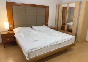 Llit o llits en una habitació de Penzion Mlýnický Dvůr