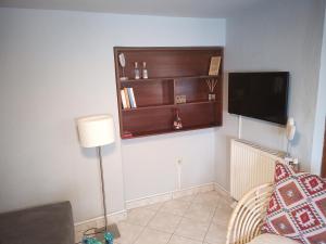 TV a/nebo společenská místnost v ubytování Plateia Apartments (Xara)