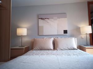 Postel nebo postele na pokoji v ubytování Plateia Apartments (Xara)