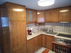 Kuchyň nebo kuchyňský kout v ubytování Plateia Apartments (Xara)