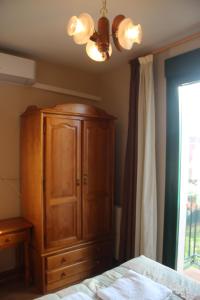 Postel nebo postele na pokoji v ubytování Hostal Maury