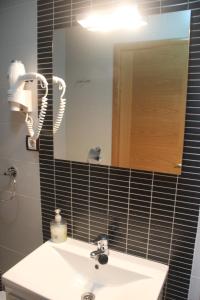 Koupelna v ubytování Hostal Maury + 28 fotografií