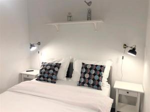 Postel nebo postele na pokoji v ubytování Apartments & Rooms Formenti