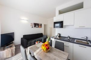 A kitchen or kitchenette at Lara's Guesthouse