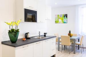A kitchen or kitchenette at Lara's Guesthouse