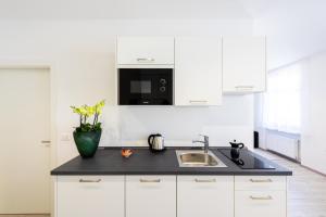 A kitchen or kitchenette at Lara's Guesthouse