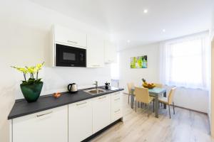 A kitchen or kitchenette at Lara's Guesthouse