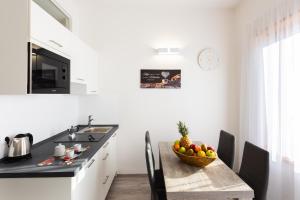 A kitchen or kitchenette at Lara's Guesthouse
