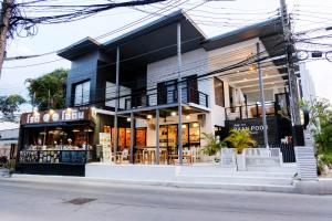 a store front of a building on a street at Baan Poon Garden in Chaweng
