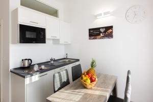 A kitchen or kitchenette at Lara's Guesthouse