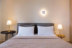 
Een bed of bedden in een kamer bij Niki Sunrise Apartments
