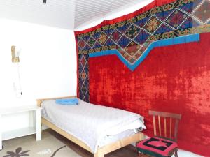 Voodi või voodid majutusasutuse Guest House Jekshen toas