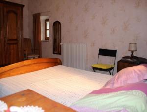 Postel nebo postele na pokoji v ubytování la maison de pierre