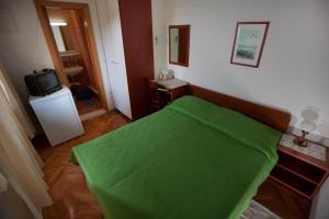 Posteľ alebo postele v izbe v ubytovaní Vila Nives