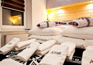 Posteľ alebo postele v izbe v ubytovaní ALVARE Apartament - Krynica Zdrój noclegi