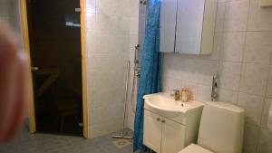 Koupelna v ubytování Ruskalinna Apartments + 9 fotografií