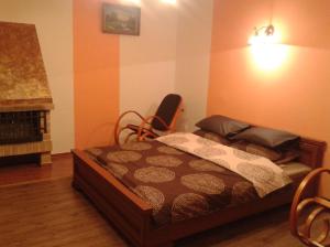 Rúm í herbergi á Apartman Nadezda