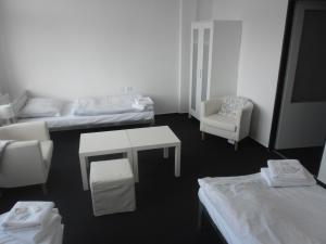Rúm í herbergi á bike-Hotel Měděnec