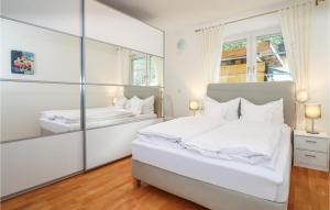 Tempat tidur dalam kamar di Beautiful Apartment In Elmen With Kitchen