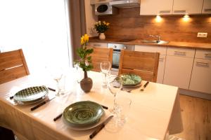 Kuchyň nebo kuchyňský kout v ubytování Apartments Marie B