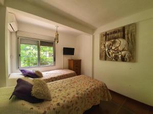 Posteľ alebo postele v izbe v ubytovaní Pinar de Hurtado