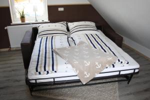 Postel nebo postele na pokoji v ubytování Ferienwohnung Elbkoje