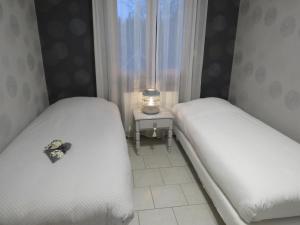 Chambre d'hôtes La Clé du Bonheur客房内的一张或多张床位