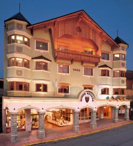a large building with a store front with at Hotel Nevada in San Carlos de Bariloche