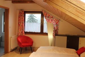 Postel nebo postele na pokoji v ubytování Gästehaus am Sonnenberg