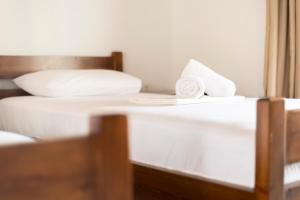 Postel nebo postele na pokoji v ubytování Margarita Guesthouse