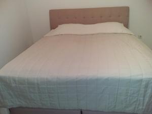 Postel nebo postele na pokoji v ubytování House apartments Ariamare