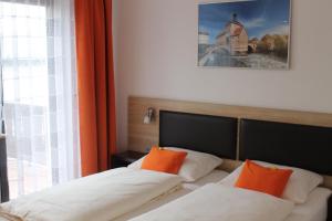 Postel nebo postele na pokoji v ubytování Gästehaus am Sonnenberg