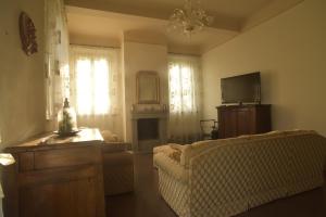 TV a/nebo společenská místnost v ubytování B&B Le Ripe