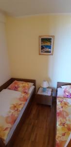 Posteľ alebo postele v izbe v ubytovaní Villa Katarina