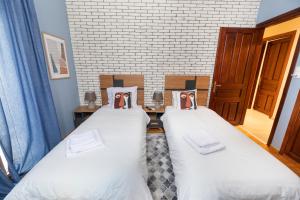 Posteľ alebo postele v izbe v ubytovaní Palazzo di Meteora