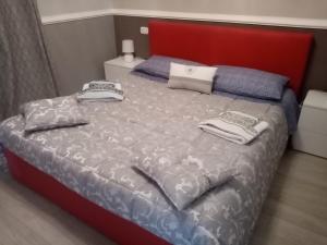Cama ou camas em um quarto em Appartamento rosariomaria