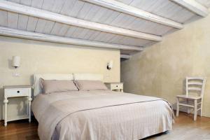 Letto o letti in una camera di Borgo del Carato